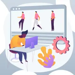 Tworzenie animacji do **explainer video**. Mężczyzna pracuje przy komputerze, tworząc ruchome postacie na ekranie.